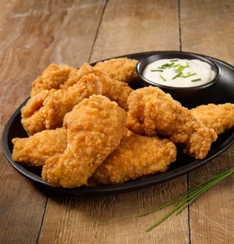 Ailes de poulet saupoudrées coupées, enrobées et crues (assaisonnées)