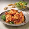 Dusted chicken wings, cut-up, seasoned and fully cooked