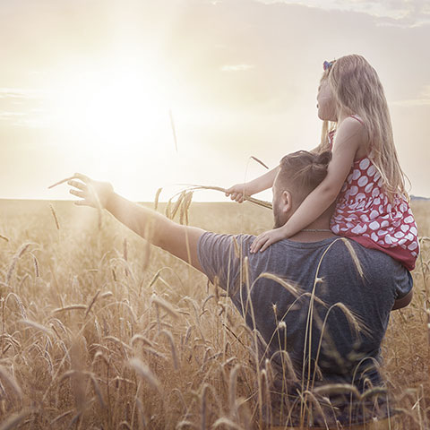 Young family in a crop